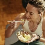 Woman eating after workout.