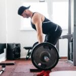 Man doing romanian deadlift.